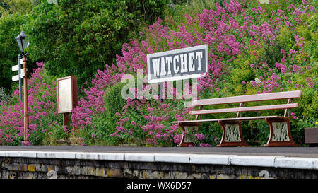 Watchet Station Sign & Bench, West Somerset Railway, Watchet, Somerset, UK Stock Photo