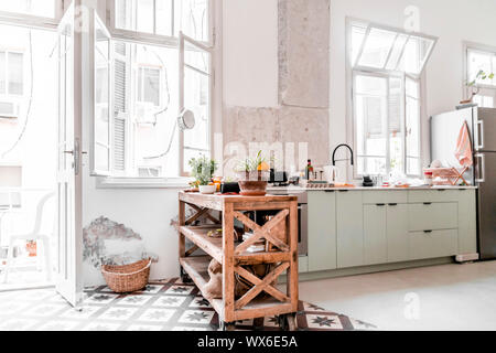 Modern interior design, renovated high-ceiling apartment with vintage and modern details combined Stock Photo