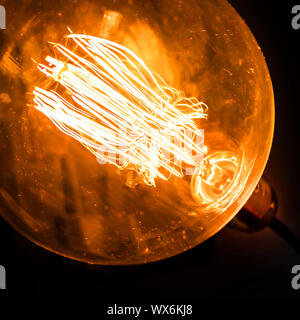Incandescent filaments light bulb Stock Photo