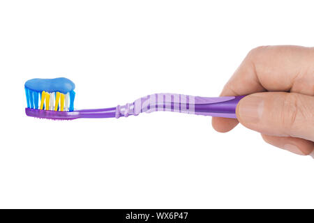 Hand with toothbrush Stock Photo