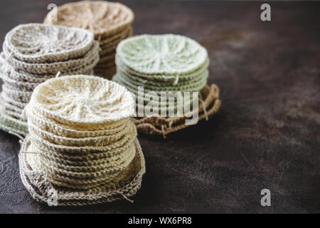Crochet yarn, crochet hooks, and hand made granny squares. Stock Photo