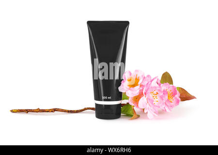 a black tube with cherry blossoms on a white background Stock Photo
