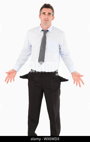 Portrait of a ruined businessman against a white background Stock Photo