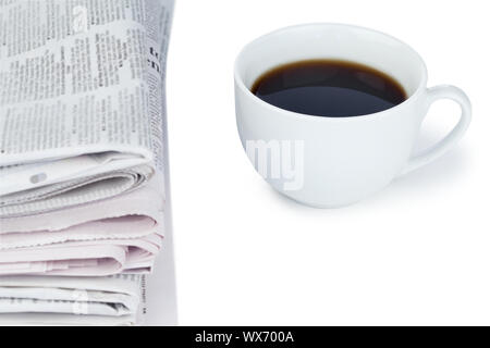Stack of newspapers and cup of coffee on a white background Stock Photo