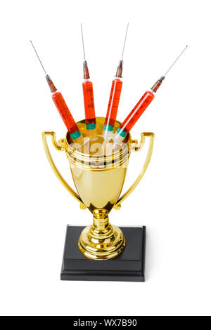 Golden trophy cup and syringes Stock Photo