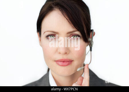 Charismatic businesswoman using headset on in a call center Stock Photo