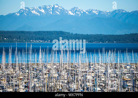 olympic mountains and boat marina in puget sound washington state