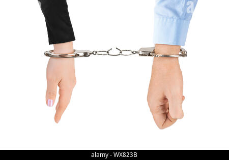 Man and woman hands and breaking handcuffs Stock Photo