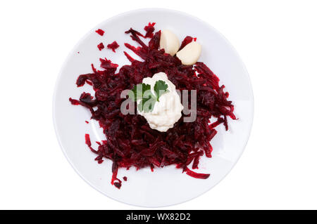 Grated beets in a plate isolated on white background Stock Photo