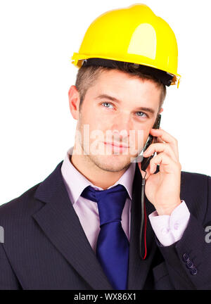 Young Construction worker talking on the phone Stock Photo