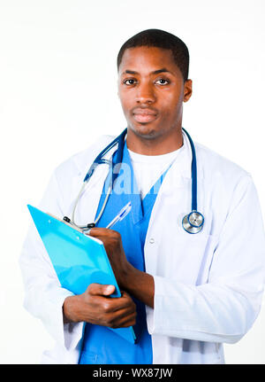 Serious Afro-American doctor holding a clipboard and looking at the camera Stock Photo