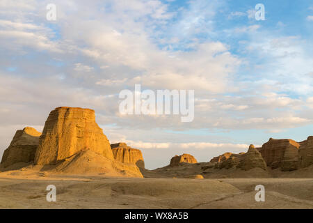 beautiful xinjiang ghost city in sunset Stock Photo