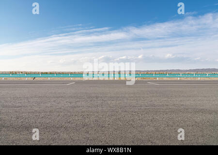 Empty asphalt road ground and blue sky with white clouds scene Stock ...