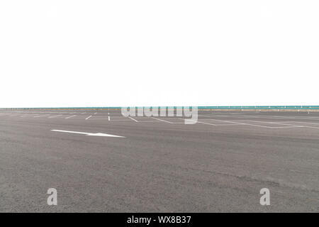 asphalt road surface on parking lot near the highway Stock Photo
