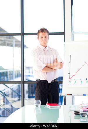 Smiling businessman giving a presentation Stock Photo