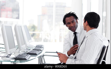 Business men having a discussion Stock Photo