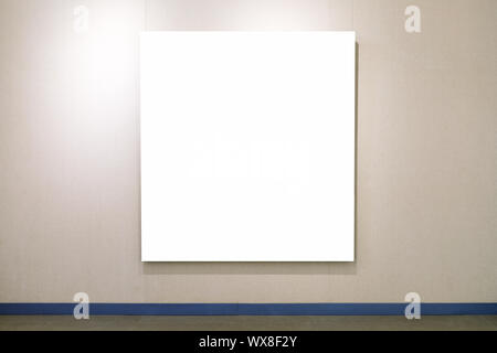 blank picture frame on exhibition wall Stock Photo
