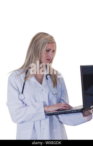 Female doctor working on a laptop Stock Photo