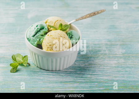 Ice cream with mint in ceramic bowl Stock Photo