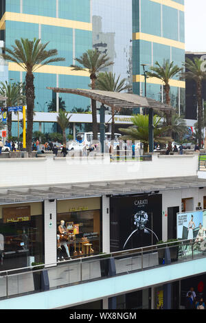 LIMA, PERU - JULY 23, 2013: The shopping mall Larcomar built on the steep coast of Miraflores with the JW Marriott Hotel Lima in the back Stock Photo