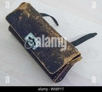 old rotten leather purse Stock Photo