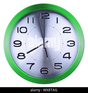 Wall clock isolated on white background. Eight oclock. Stock Photo