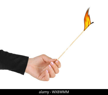 Hand with big burning match Stock Photo