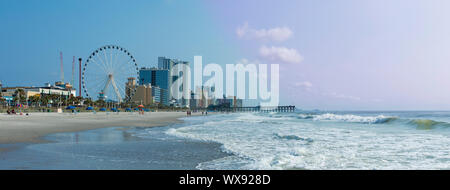 Panoramic view of Myrtle Beach, South Carolina with beach, hotels, ferris wheel, and boardwalk. Stock Photo