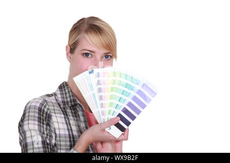 Woman choosing new color for house Stock Photo