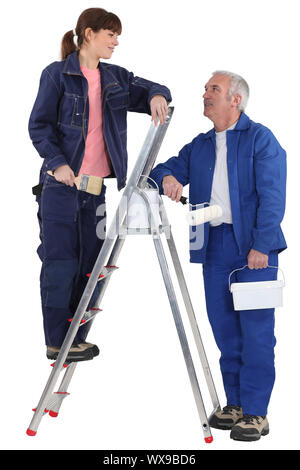 A painter and his apprentice. Stock Photo