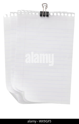 Few pieces of notebook paper with clip on a close up image Stock Photo
