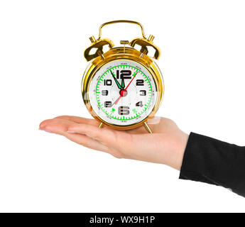 Hand with alarm clock Stock Photo