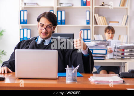 Two lawyers working in the office Stock Photo
