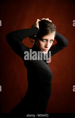 Pretty woman in a black dress Stock Photo