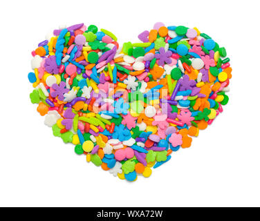 Candy Sprinkles in Heart Shape Isolated on White. Stock Photo