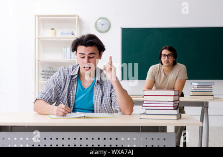 Two male students in the classroom Stock Photo