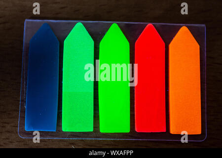 Arrows with luminous color in UV light Stock Photo