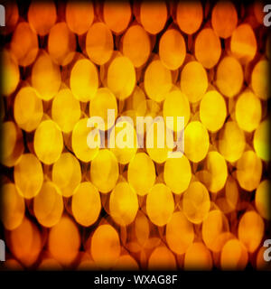 Photo of abstract blur background, golden festive backdrop, Christmas celebration, yellow glowing lights at night, magic vivid shine, New Year party, Stock Photo