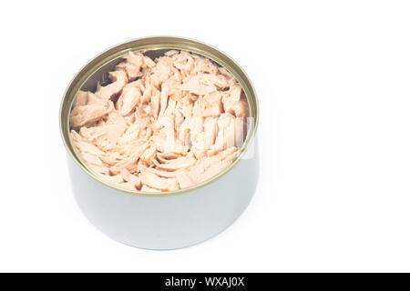 Tuna in vegetable oil in opened can on white isolated Stock Photo