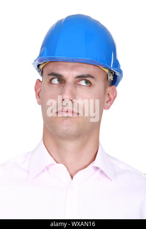 A suspicious-looking engineer Stock Photo