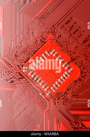 Red circuit board close-up. Electronic background Stock Photo