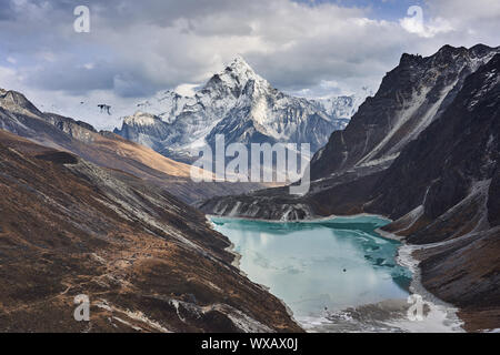 Glacial lake in front of Mountain Ama Dablam Stock Photo