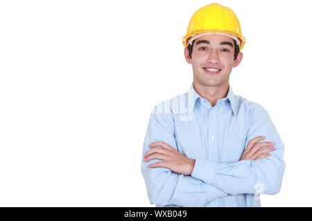 portrait of young foreman all smiles isolated on white Stock Photo