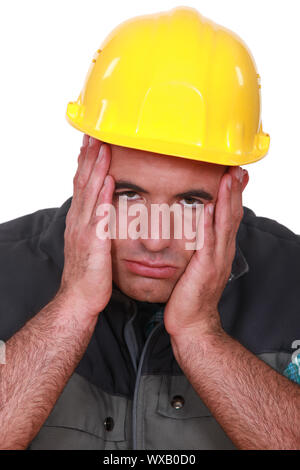 Stressed builder Stock Photo