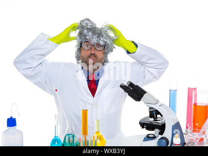Crazy mad nerd scientist funny expression at laboratory on chemical experiment Stock Photo