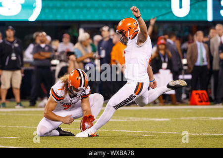 Cleveland Browns punter Jamie Gillan (7) gets stripped of the ball while  faking a punt as Baltimore Ravens linebacker L.J. Fort (58) and linebacker  Otaro Alaka (50) recover the fumble during the