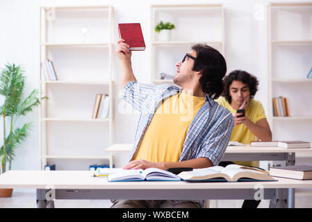 Two male students in the classroom Stock Photo