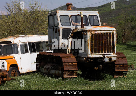 weathered old soviet bulldozer Stock Photo