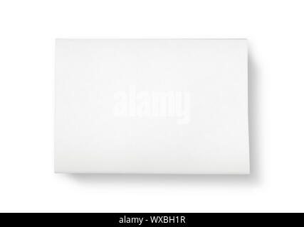 A stack of newspapers with blank space for information. Top view shot. Isolated on white. Stock Photo
