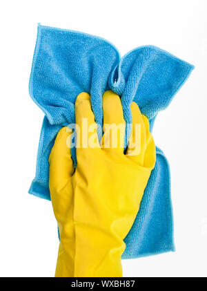 Hand in yellow protective glove  with blue duster on white background Stock Photo
